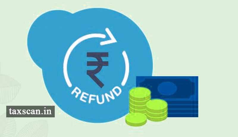 Sales Tax Refund - Refund - CST Act - Person - Tax Burde - Gujarat HC - taxscan